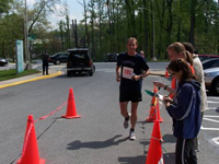 NIH Health Angels Halo Chase participant finishing the race