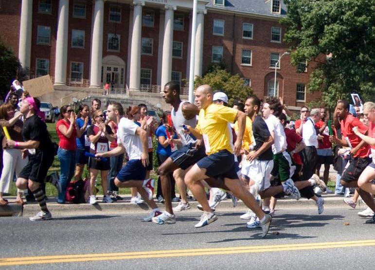 People running at NIH in front of Building 1