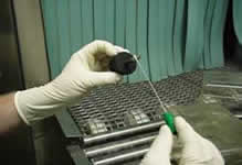 Using a swab to collect diagnostic sample from a sipper tube