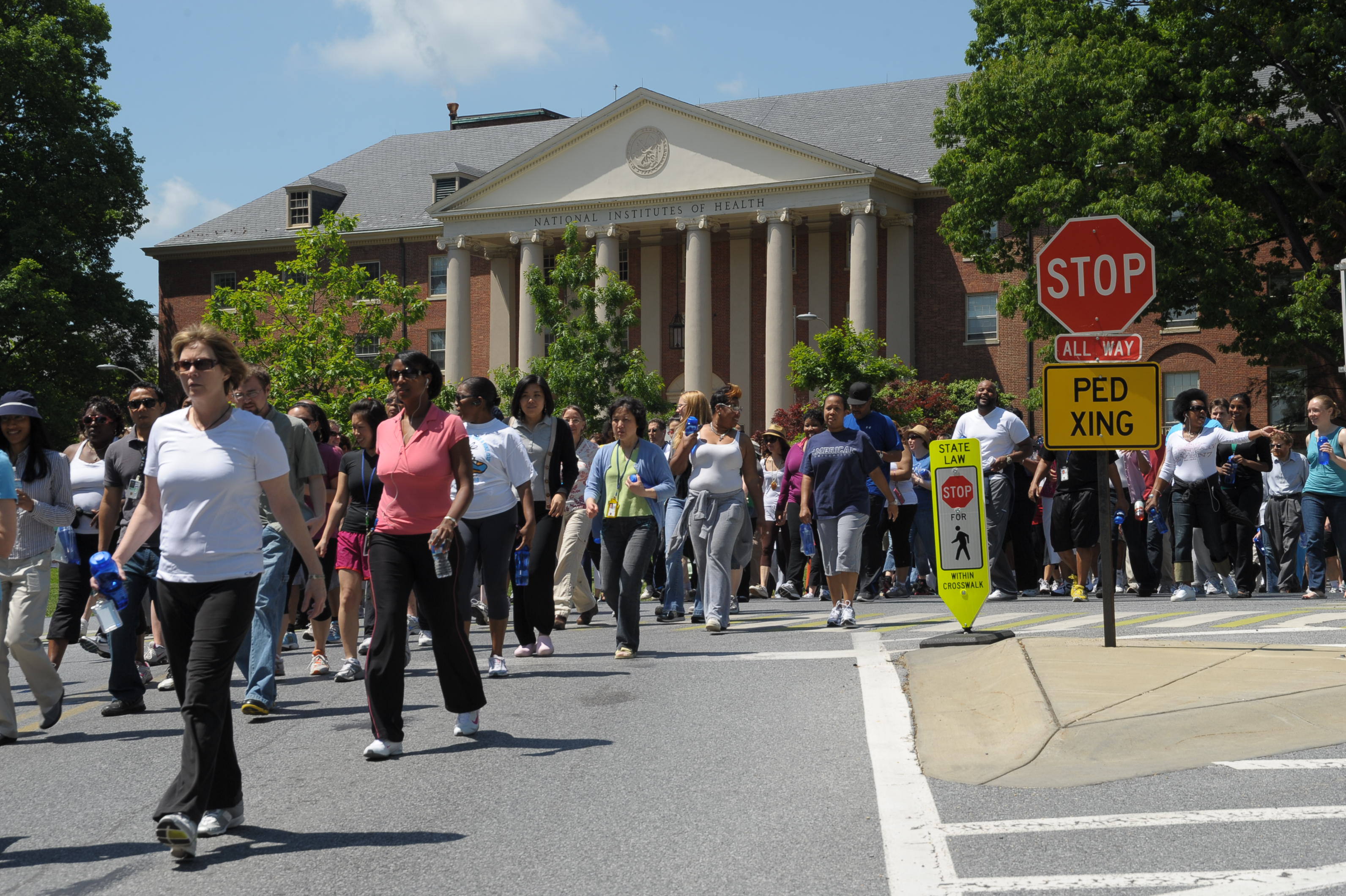 Take a Hike Day group in front of bldg 1 walking down Wilson Dr. Take a Hike Day group infront of bldg 1