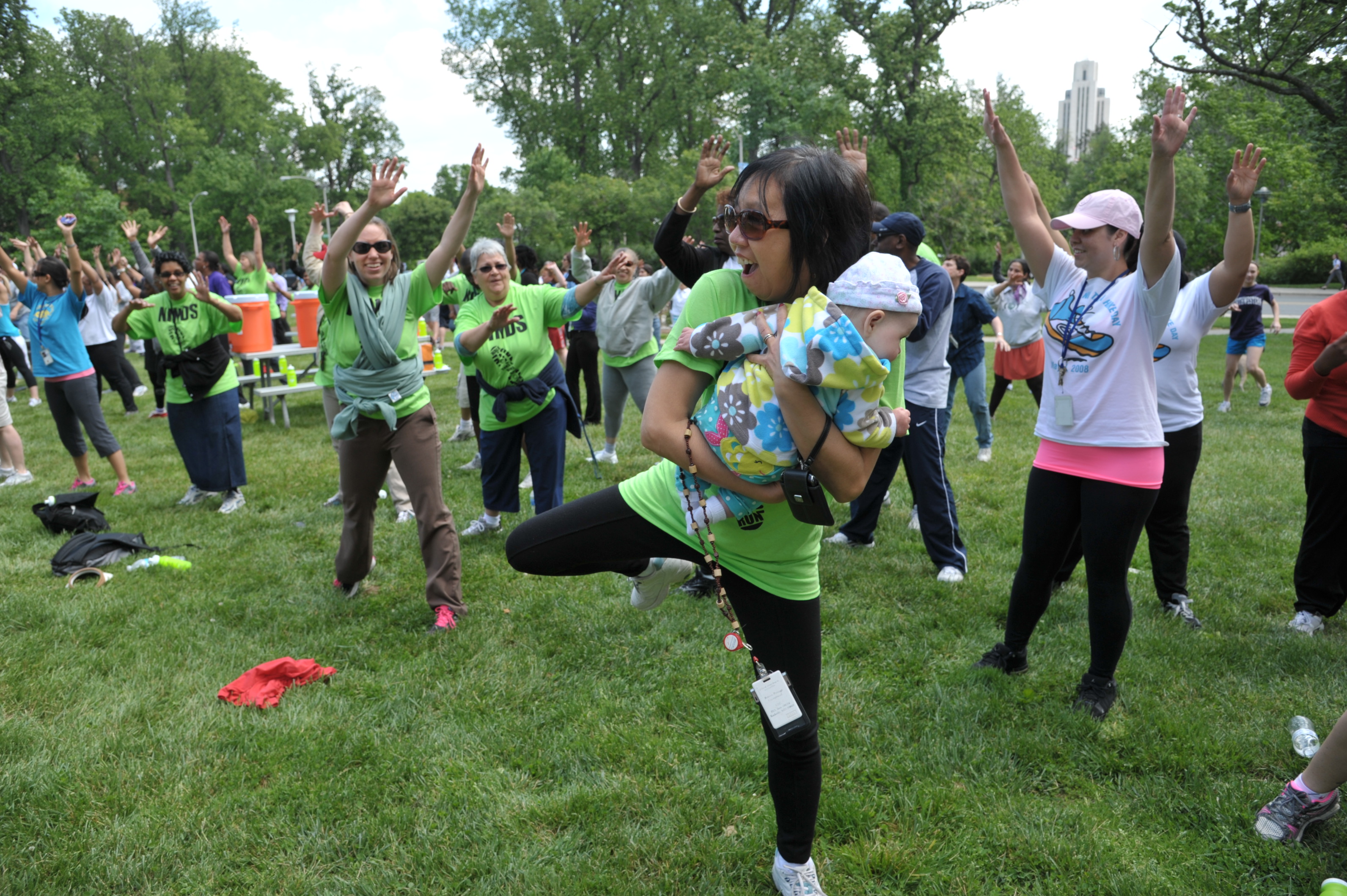 Warm Up #3 Employees exercising with baby