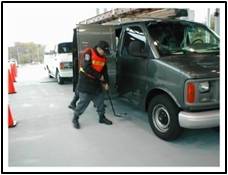 Guard screening a commercial vehicle